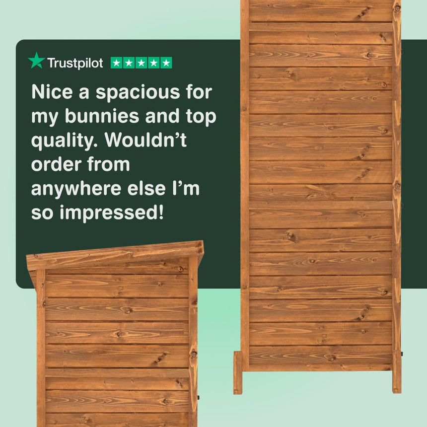 Wooden rabbit hutch with positive review text on a green background