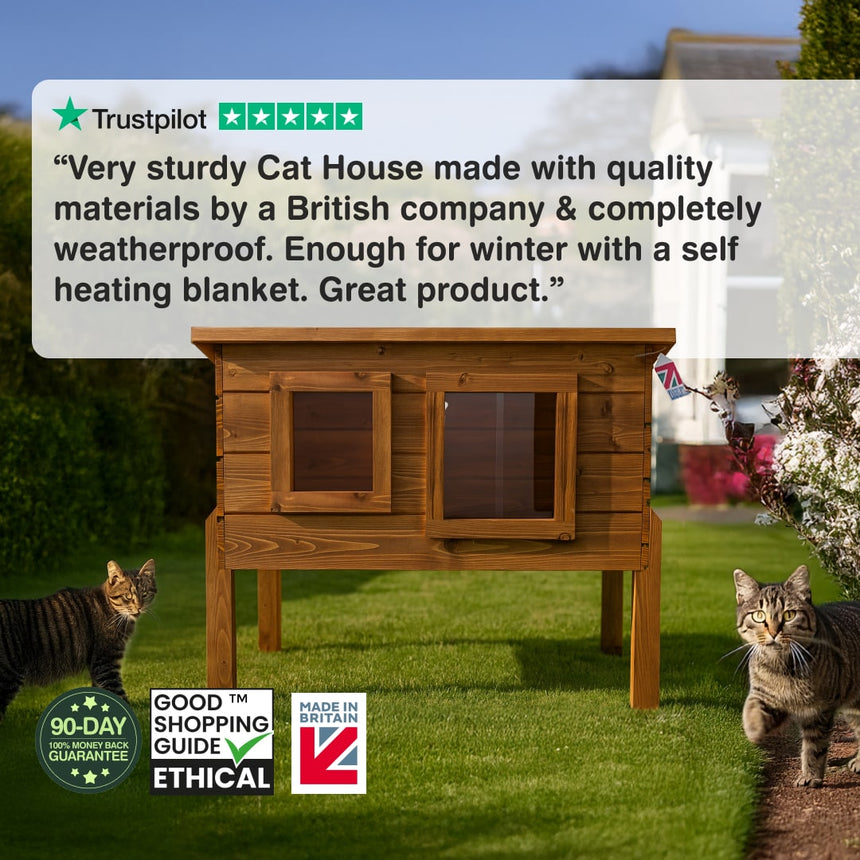 Wooden cat house on grass with cats around, featuring Trustpilot review and brand logos. “Very sturdy Cat House made with quality materials by a British company & completely weatherproof. Enough for winter with a self heating blanket. Great product.”