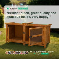 Wooden animal hutch on grass with Trustpilot 5 star reviews text overlay