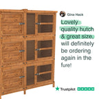 Wooden pet hutch with a positive review from Gina Hack on a white background