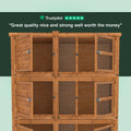 Wooden pet enclosure with mesh sides on a light green background, featuring Trustpilot rating.
