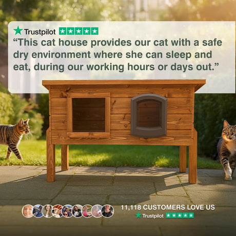 Wooden cat house with two cats outside, featuring a Trustpilot review. “Very sturdy Cat House made with quality materials by a British company & completely weatherproof. Enough for winter with a self-heating blanket. Great product.”