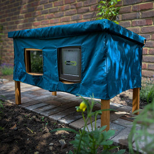 XL cat house rain cover in the garden under a cloudy sky water resistant warm and cosy for your cat