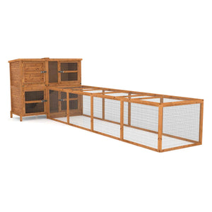 Wooden rabbit run enclosure with a hutch on a white background