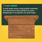 Wooden hedgehog house with Trustpilot review on a yellow and green background