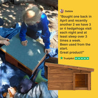 Child interacting with a wooden hedgehog house, with a Trustpilot review on a yellow background.