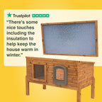 Wooden pet house with insulation on a yellow background, featuring Trustpilot rating. "There are some nice touches, including the insulation to help keep the house warm in winter."