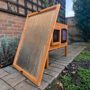 Insulated outdoor cat house, designed to keep cats warm and comfortable