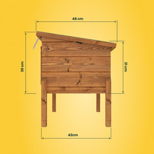 Wooden beehive with dimensions marked on a yellow background