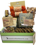 Rabbit subscription Box of pet products, including treats, toys, and a hay cube with 'Bunnies that Lunch' branding.
